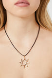 Blackgold Cutout Sun Pendant Necklace